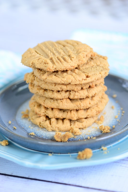 vegan peanut butter cookies stacked on a plate