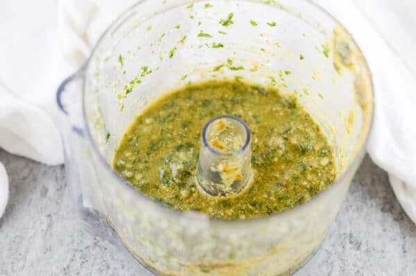 vegan pesto being made in a food processor