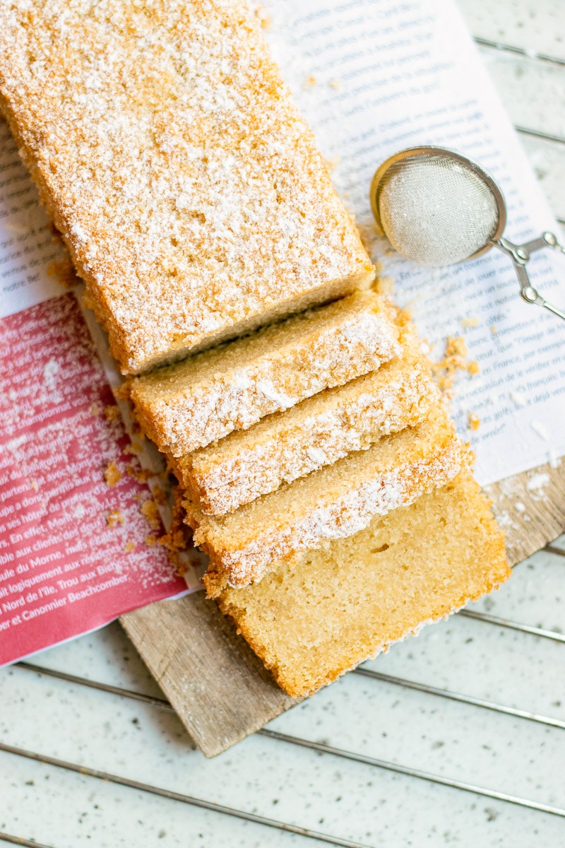 vegan pound cake topped with powdered sugar