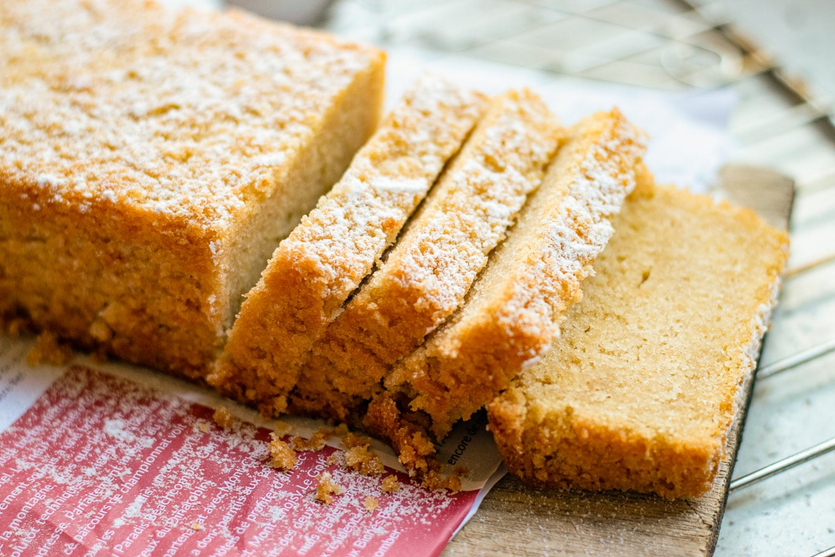 sliced vegan pound cake on a cutting board