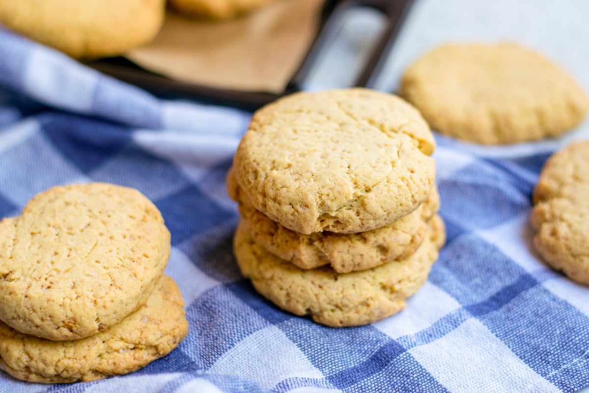 stack of vegan pumpkin cookies on a blue napkin