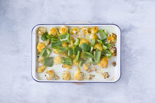 roasting cauliflower and green pepper at the same time on a baking sheet