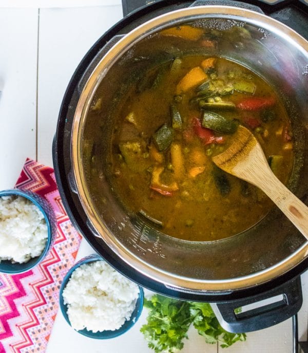 stirring vegetable curry in instant pot