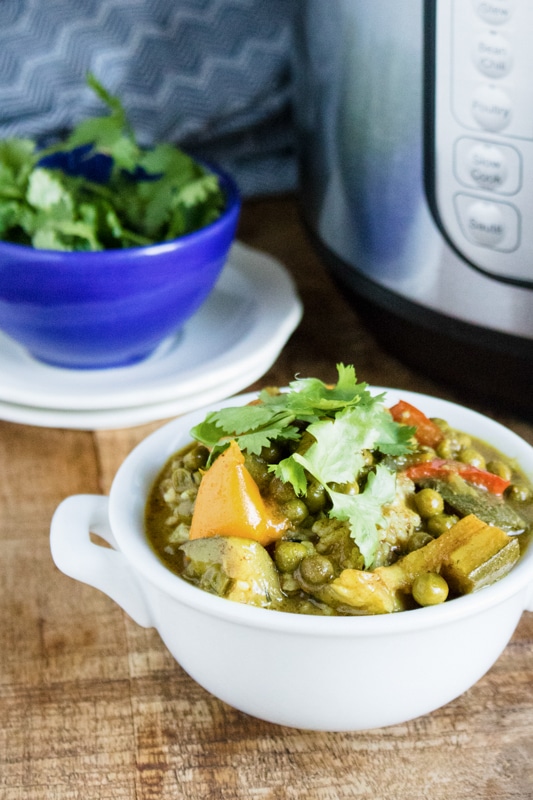 vegetable curry being served in bowls