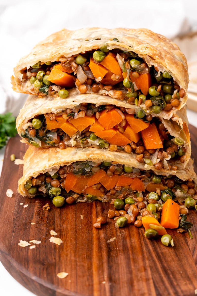 slices of the vegan vegetable wellington stacked up high