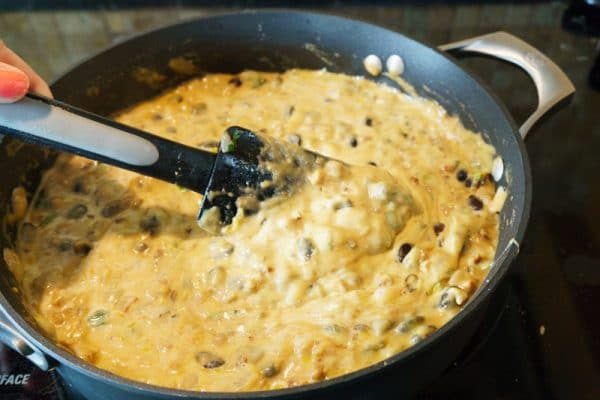 vegetarian chili cheese dip is almost ready to eat