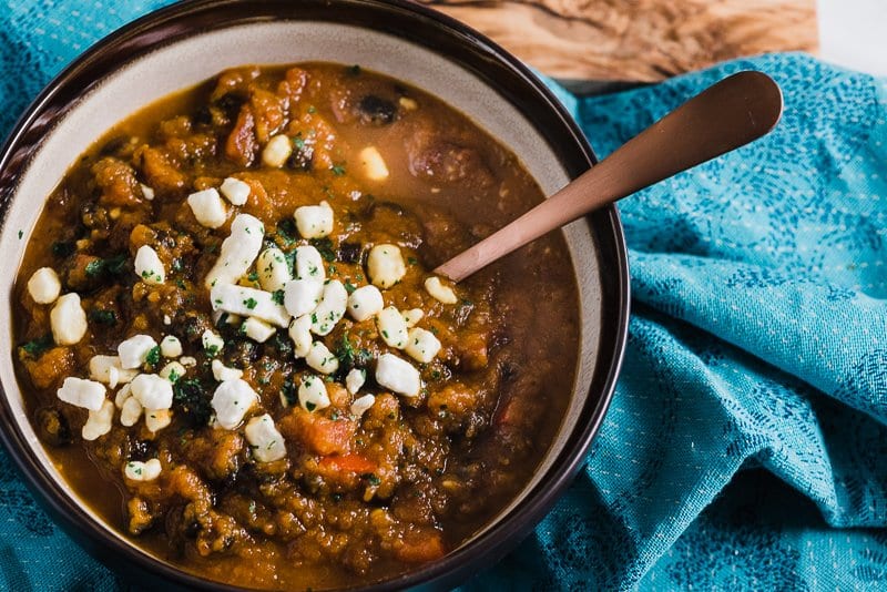 vegetarian pumpkin chili topped with goat cheese crumbles