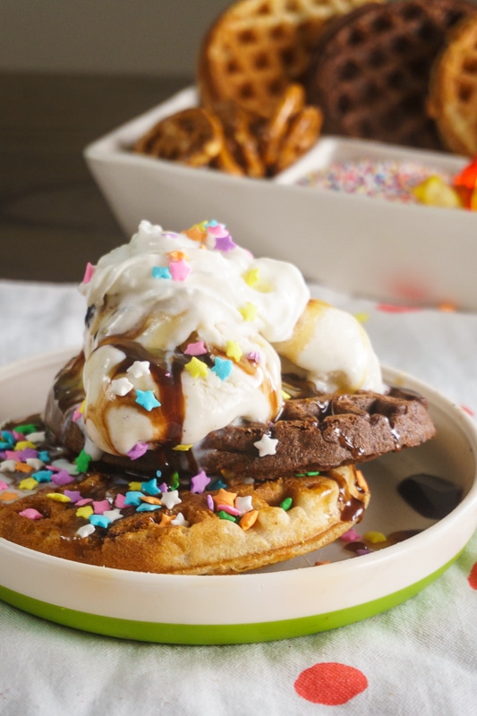 serving a waffle sundae on a green plate