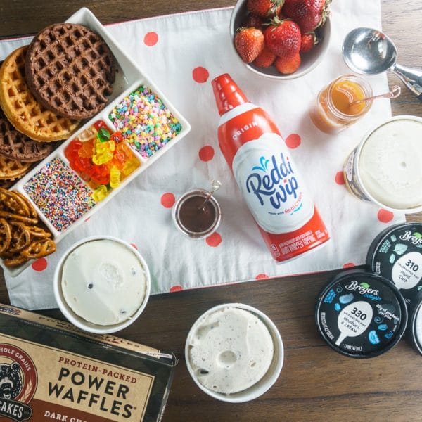 waffle sundae ingredients on a table