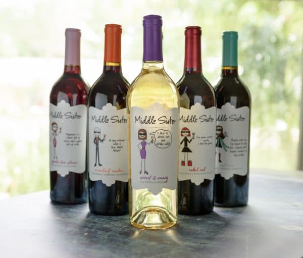 six wine bottles on table