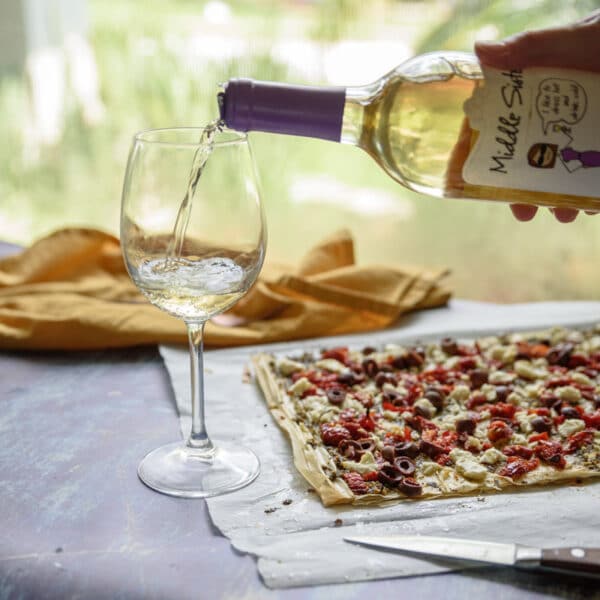 wine and flatbread by the pool