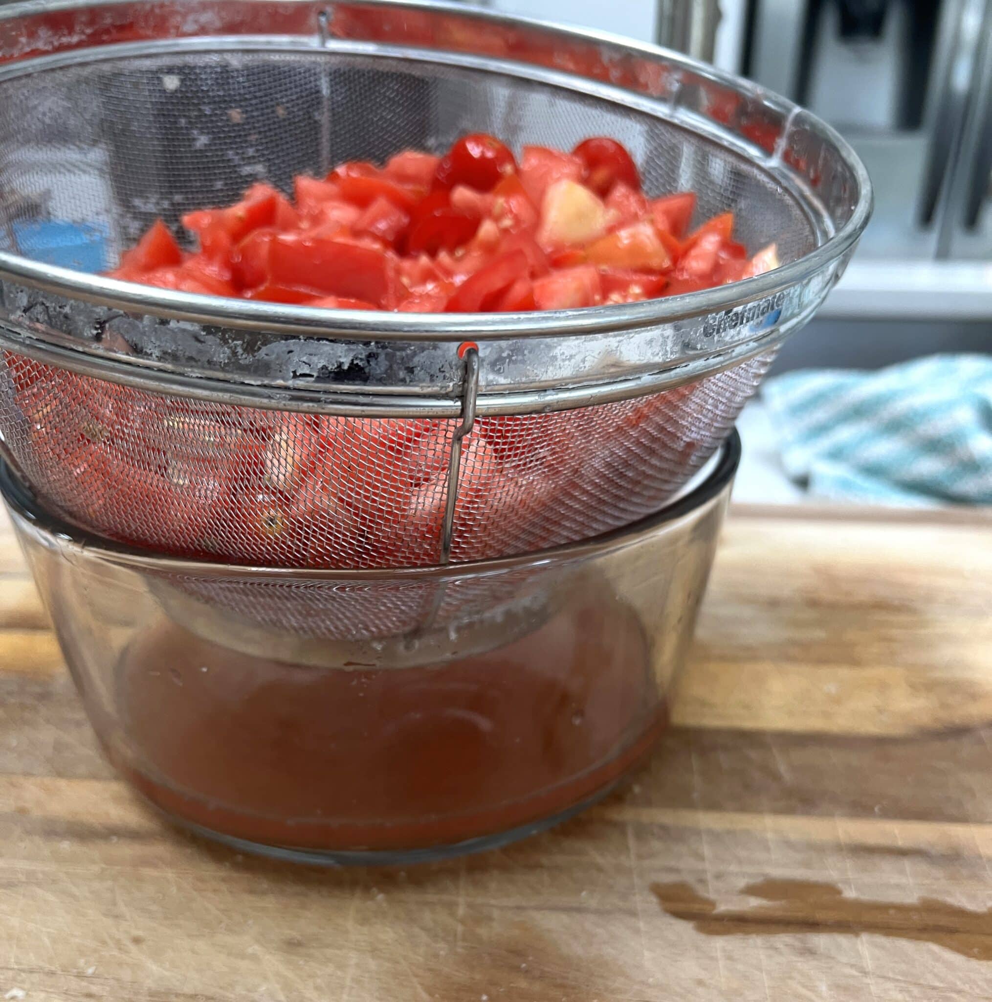 salting tomatoes for the panzanella salad