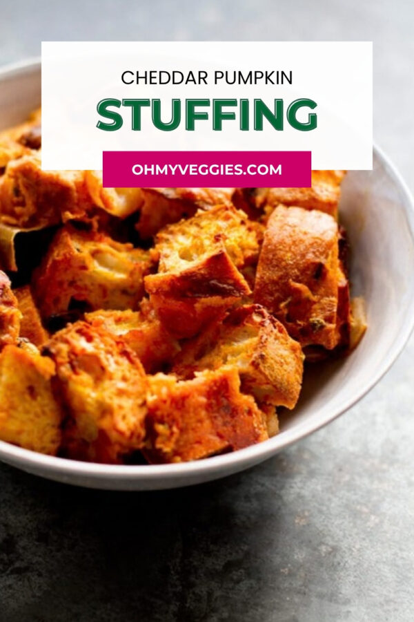 Cheddar pumpkin stuffing in a white bowl with recipe title