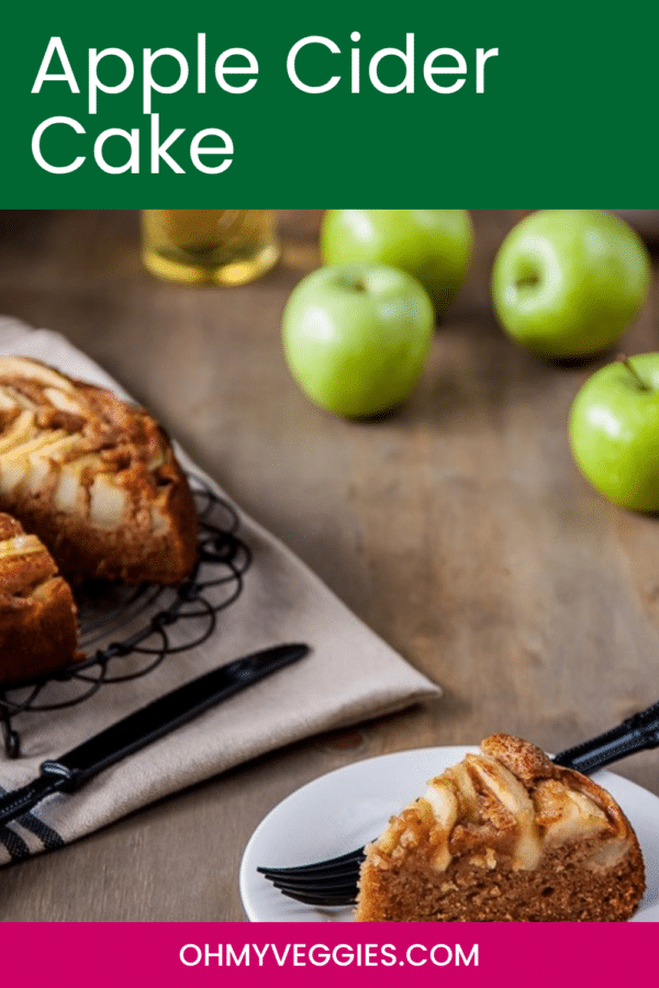 Slice of apple cider cake on a white plate with the whole cake and green apples behind it, Pinterest graphic