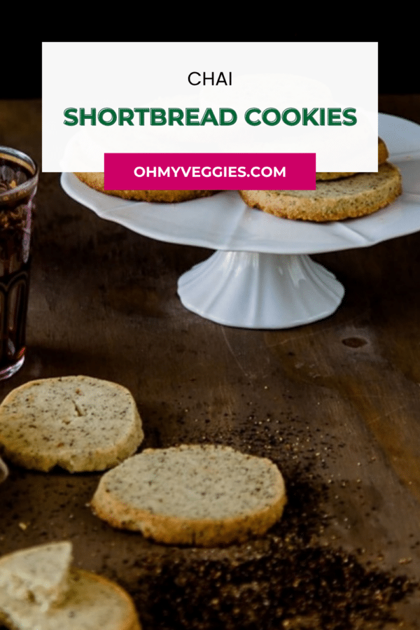 Chai shortbread cookies on a wooden board with the recipe title