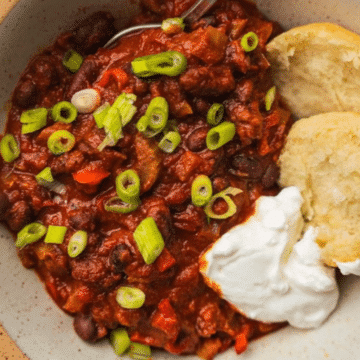 Easy vegan chili with scallions, biscuits and dairy-free yogurt
