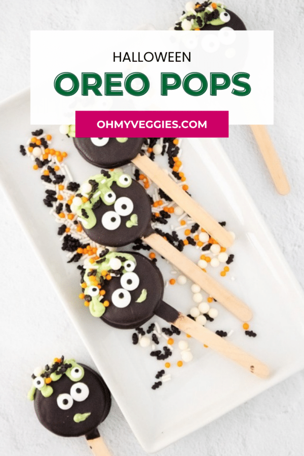 Halloween Oreo Pops on a white platter, Pinterest pin