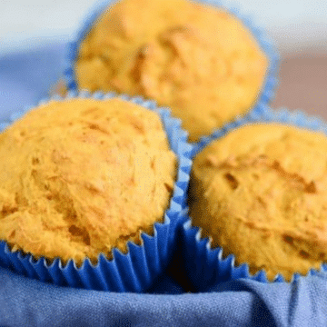 Healthy vegan gluten-free pumpkin muffins in blue paper liners