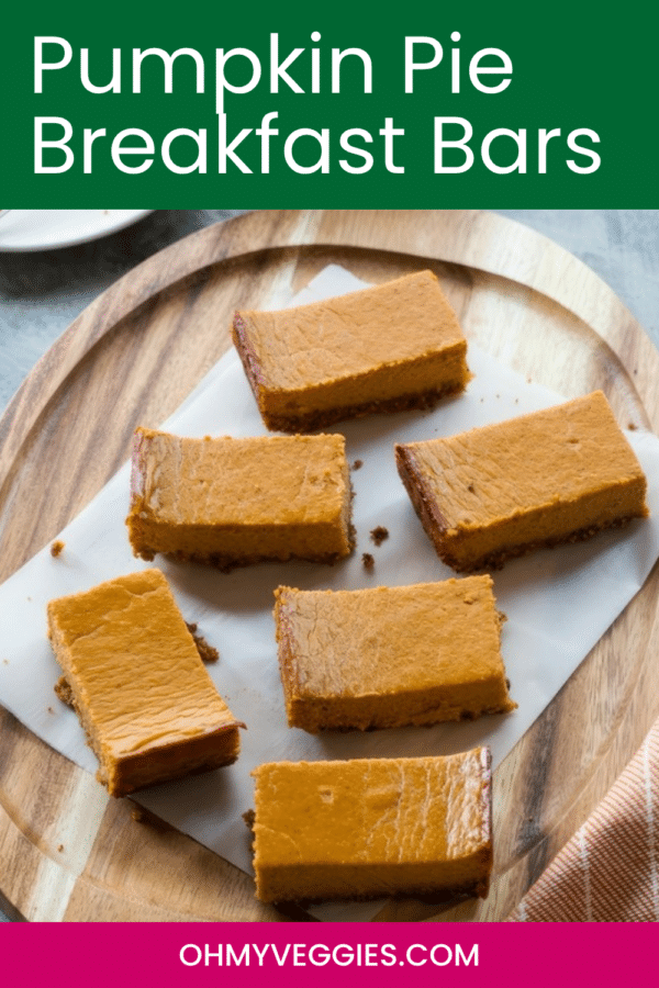 Pumpkin pie breakfast bars Pinterest graphic showing bars on a wooden board