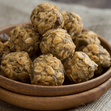 Pumpkin spice energy bites in a wooden bowl