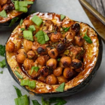Hoisin-glazed stuffed acorn squash filled with roasted chickpeas and scallions