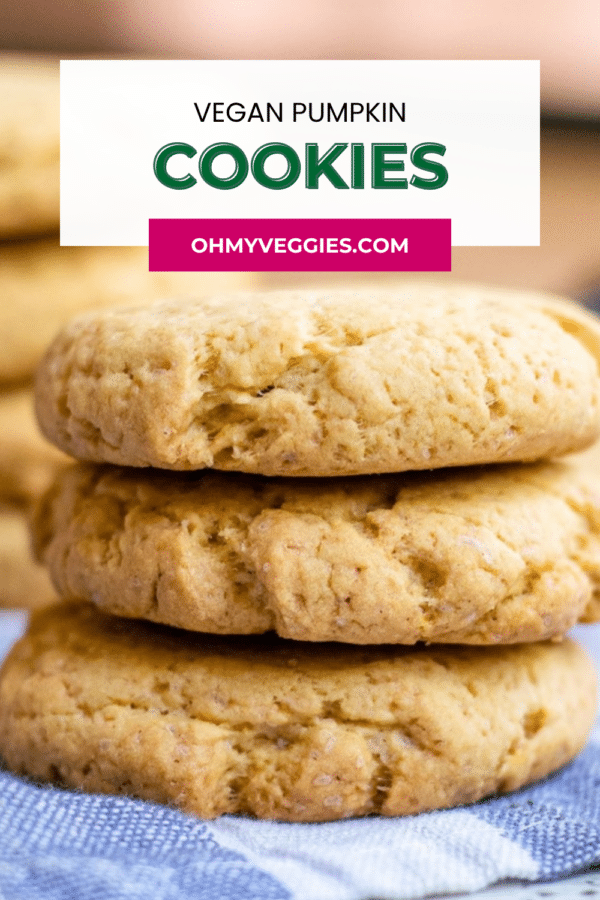 Close-up of stacked vegan pumpkin cookies with text overlay
