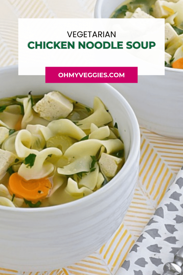 Vegetarian chicken noodle soup Pinterest graphic with a mug of soup with tofu and egg noodles